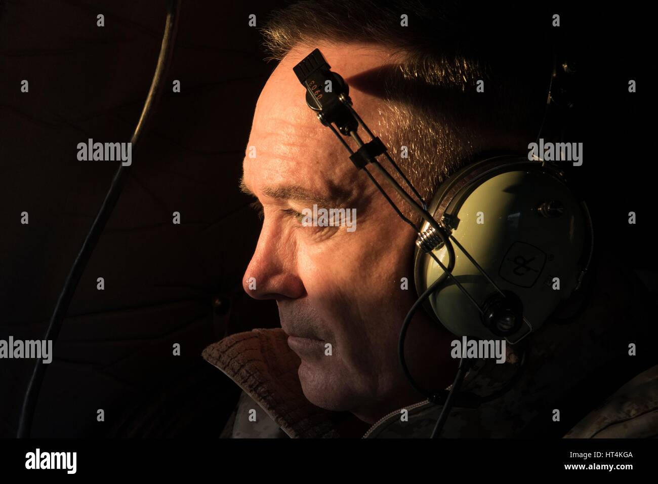U.S. Joint Chiefs of Staff Chairman Joseph Dunford looks out of the window of a Sikorsky UH-60 Blackhawk helicopter after departing a meeting with the Turkish Chief of General Staff Hulusi Akar February 17, 2017 in Turkey. Stock Photo