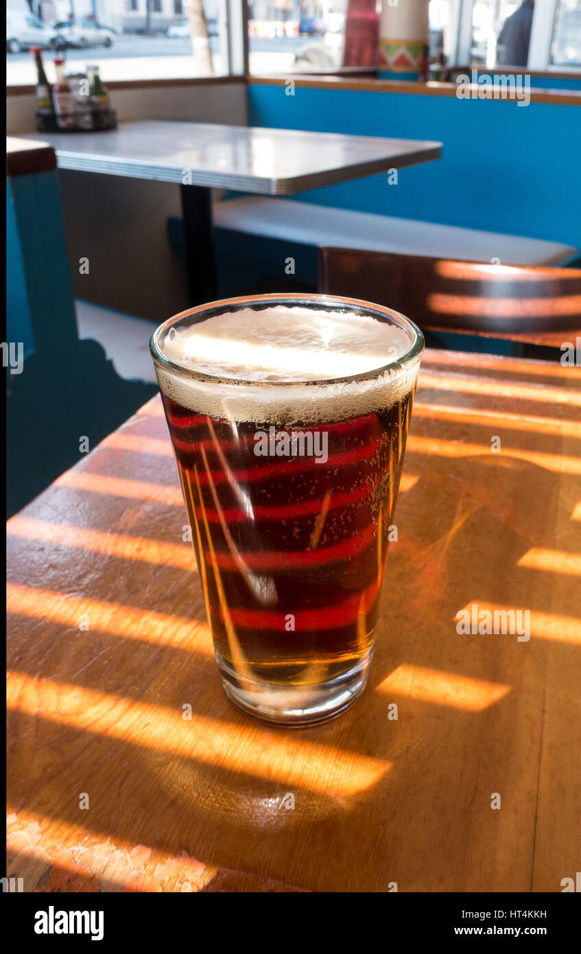 Negra Modelo a Mexican amber beer in a thin glass Stock Photo - Alamy