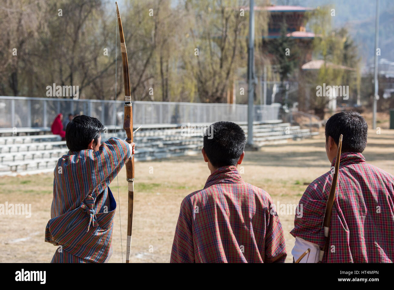 Bhutan, Thimphu, capital of Bhutan. Local archery competition played in