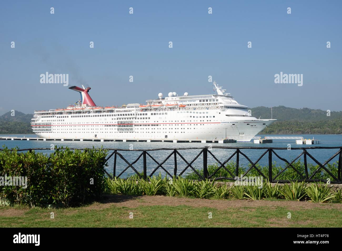 AMBER COVE DOMINICAN REPUBLIC 9 FEBRUARY  2016: Carnival ecstasy Cruise Ship in port with land in foreground Stock Photo