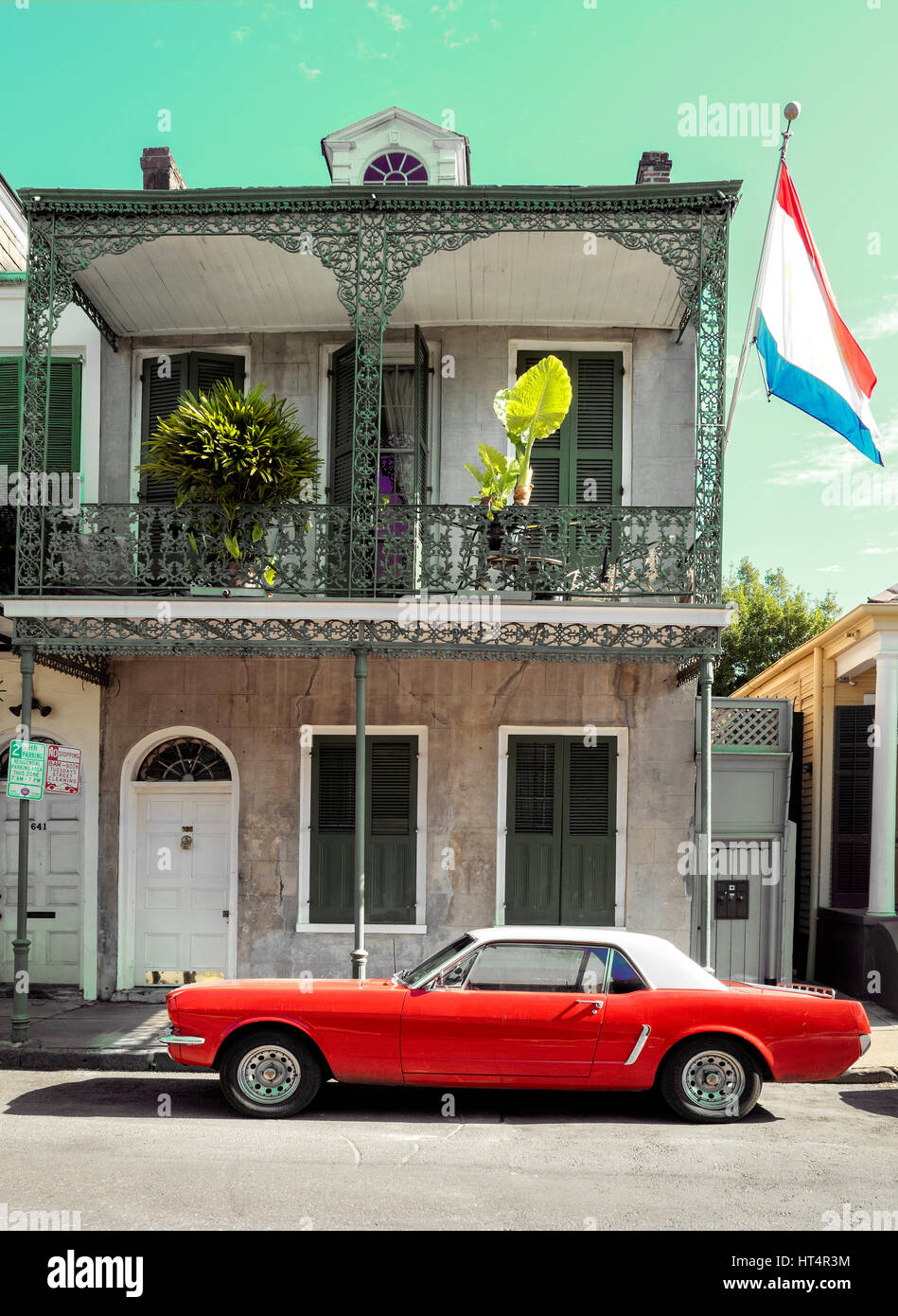Classic Cars on the street in New Orleans French Quarter. Stock Photo