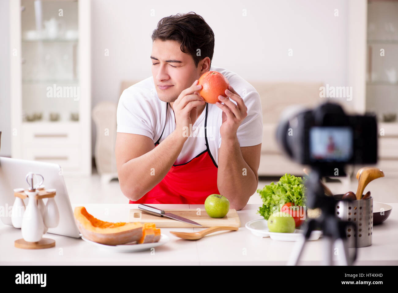Food Blogger Photo Food blogger working in the kitchen Stock Photo - Alamy