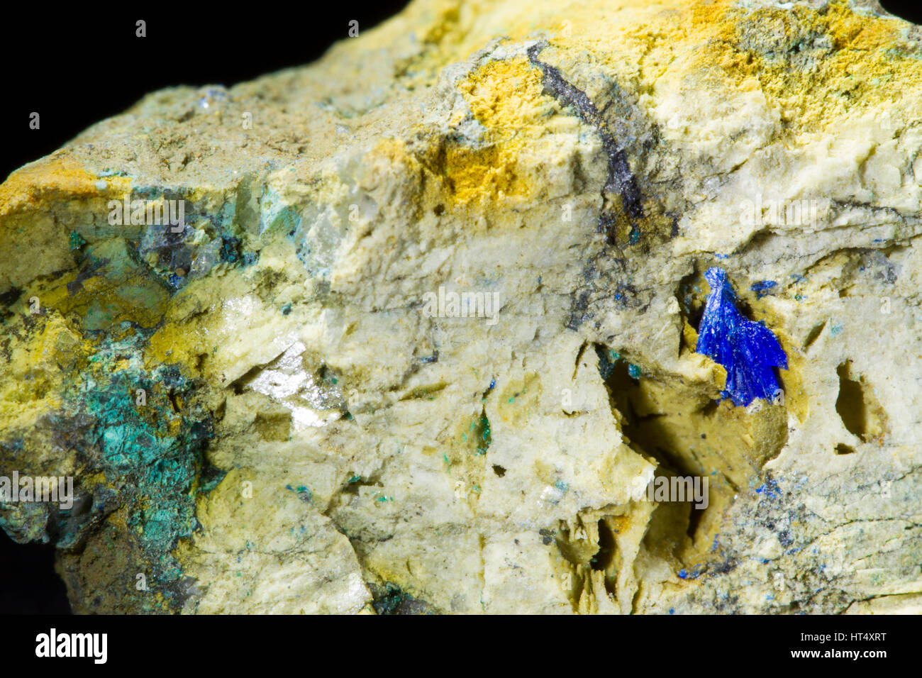 Malachite (copper carbonate) and Linarite (lead copper sulphate hydroxide)  crystals. From the Eaglebrook mine, Ceredigion, Wales. Stock Photo