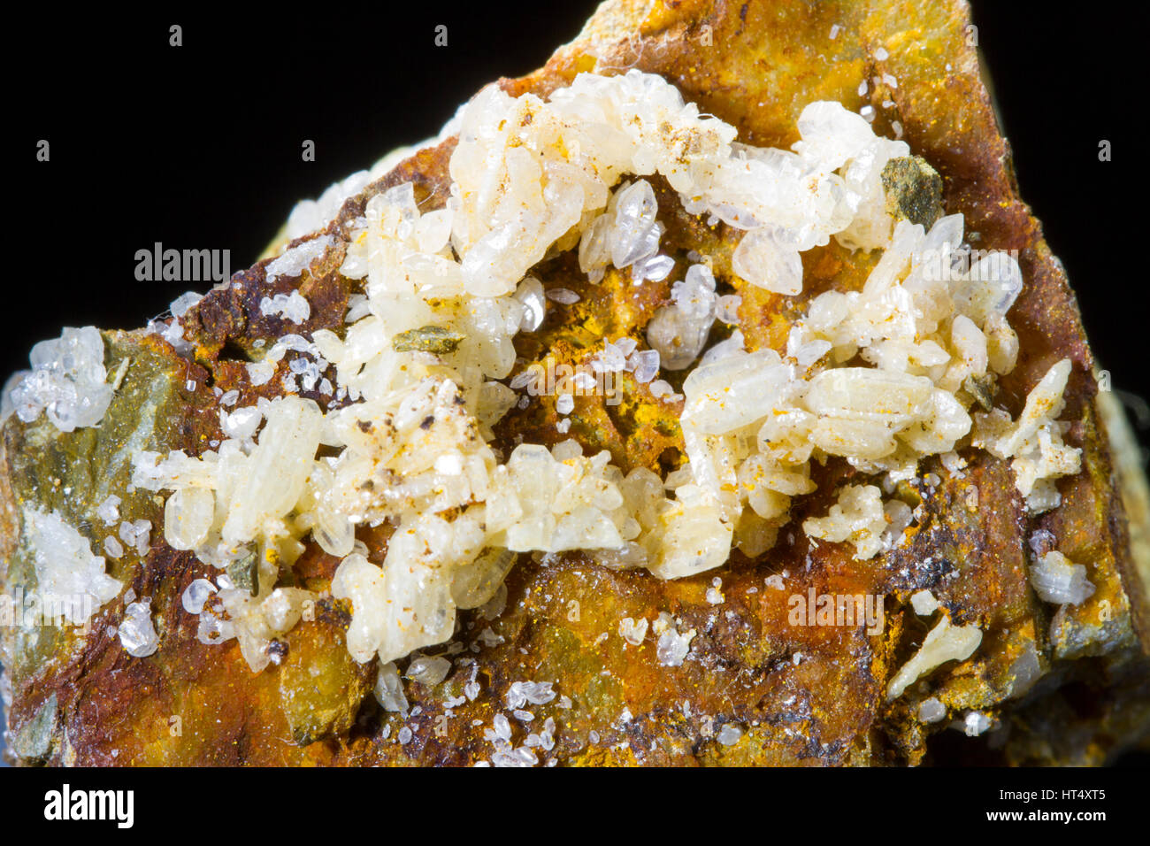 Cerrusite (lead carbonate or white lead ore) crystals on a rock sample. From the  Rhyd Fach mine. Ceredigion, Wales. Stock Photo
