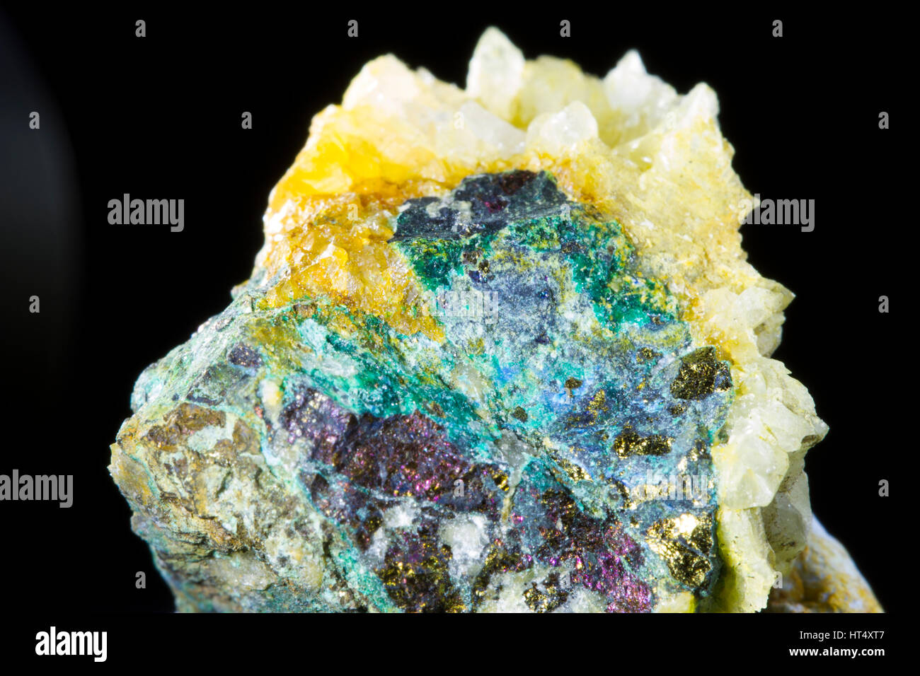 Chalcopyrite or Peacock ore (copper iron sulphide) and Malachite (copper carbonate) with quartz. From the Mynach Vale mine. Ceredigion, Wales. Stock Photo