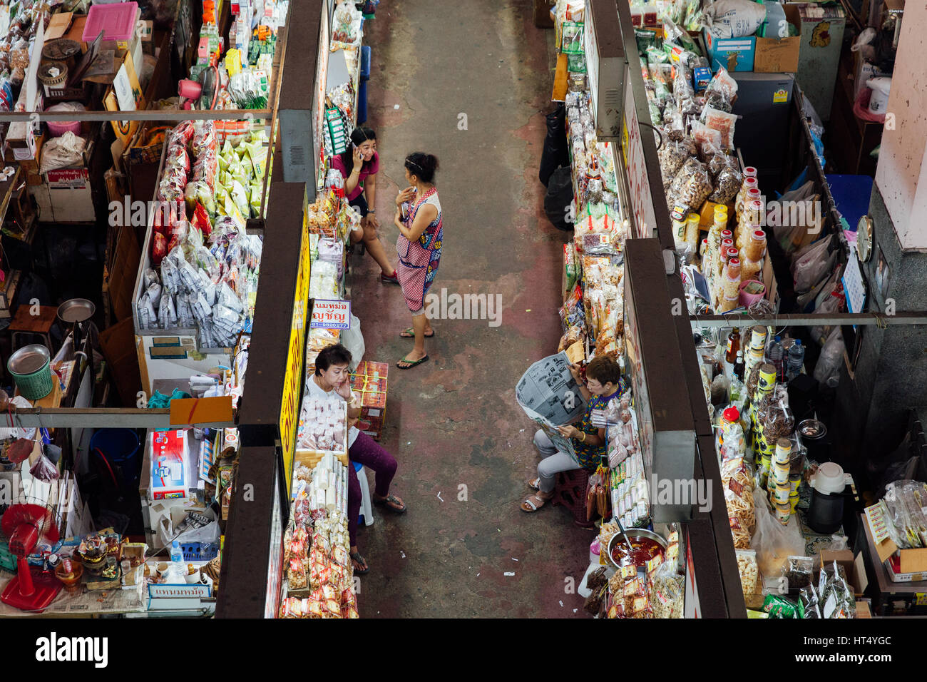 Chiang Mai, Thailand - August 27, 2016:  The group of vendors wait for customers at the Warorot market on August 27, 2016 in Chiang Mai, Thailand. Stock Photo
