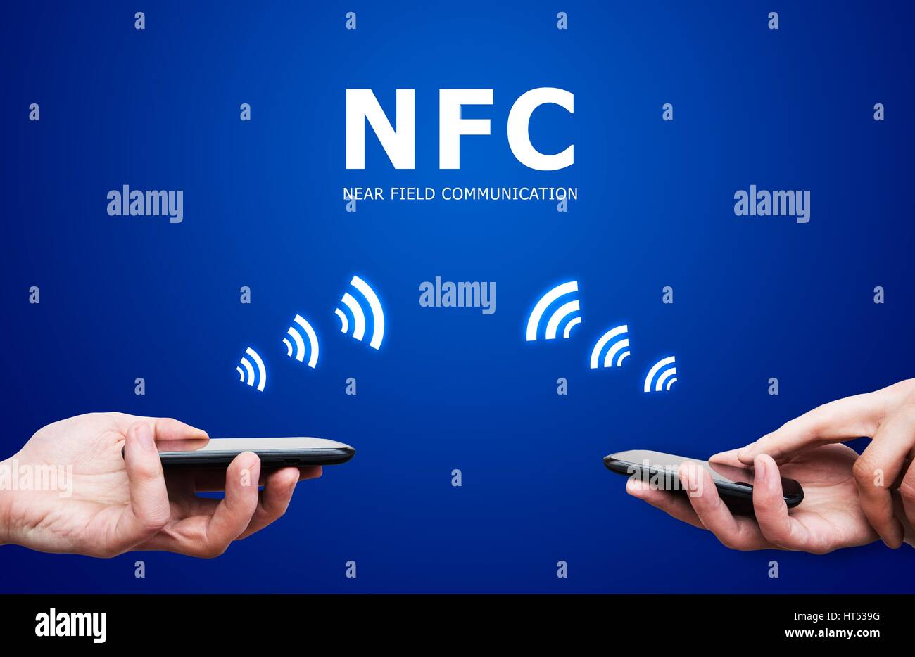Hand holding smartphone with NFC technology near field communication