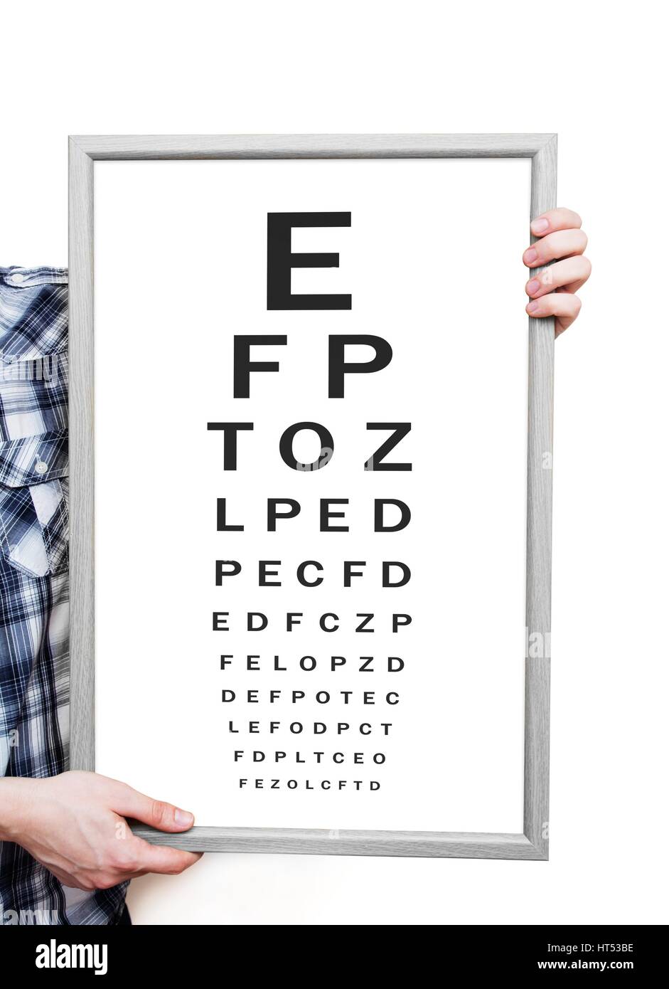 Man showing Snellen eye exam chart on white background Stock Photo