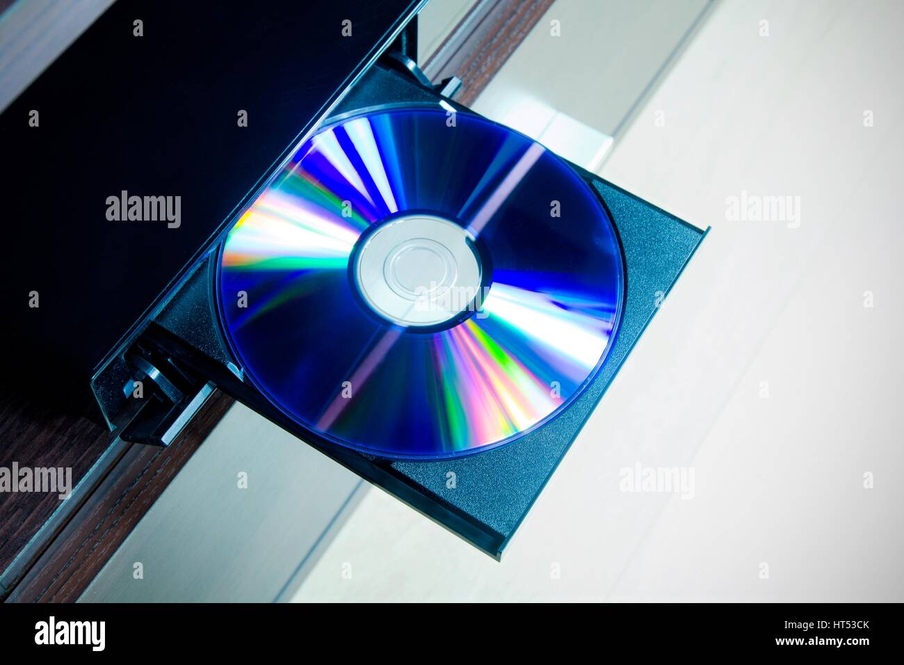 Disc insterted to DVD or CD player Stock Photo