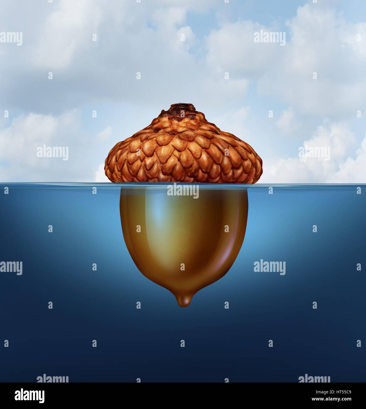 Hidden savings concept as an acorn nut with the top part floating above as an island above water and the rest under the sea. Stock Photo