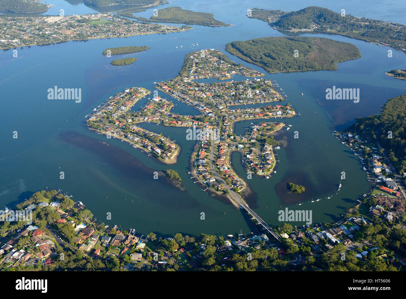 AERIAL VIEW. Canal estate of St Huberts Island in the Brisbane Water estuary. New South Wales, Australia. Stock Photo