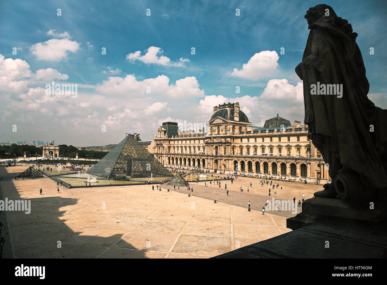 Glass pyramid at Musée du Louvre in the centre of Napoleon Courtyard.The piramid which functionts as the museum's mains entrance was built in 1989. Stock Photo