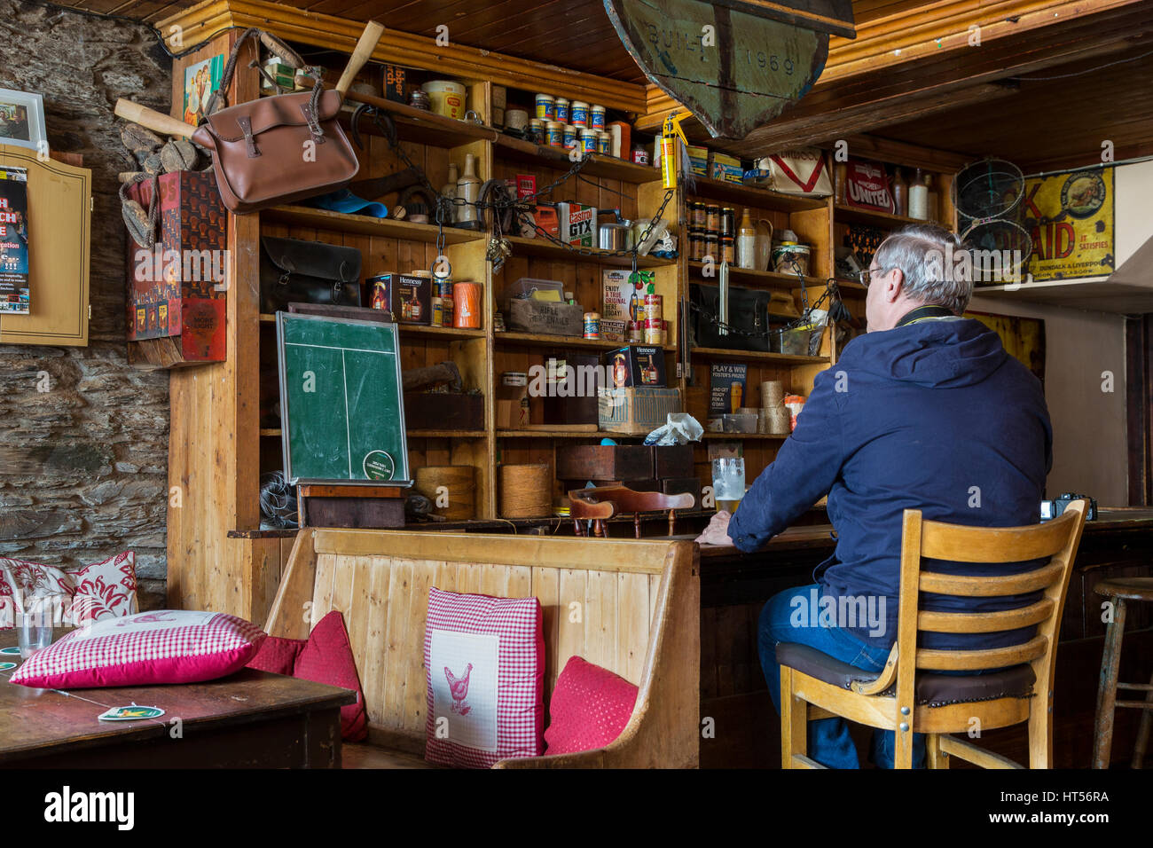 older Man drinking alone in Irish pub. Mike Murt's Cahersiveen, County Kerry Ireland Stock Photo