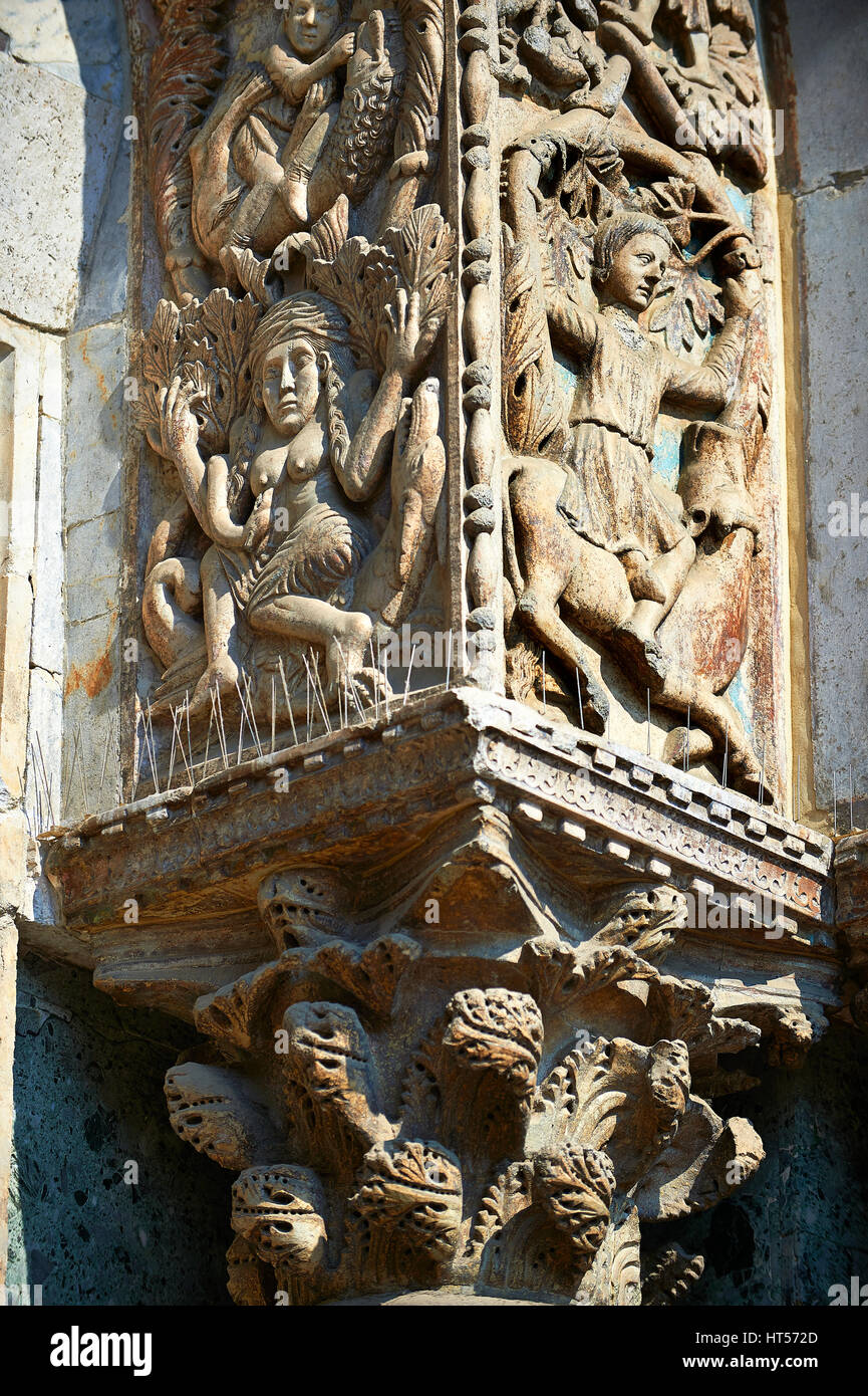 13th century Medieval Romanesque Sculptures from the facade of St Mark's Basilica, Venice, depicting "Lust" and Samson killing the lion cubs. Stock Photo
