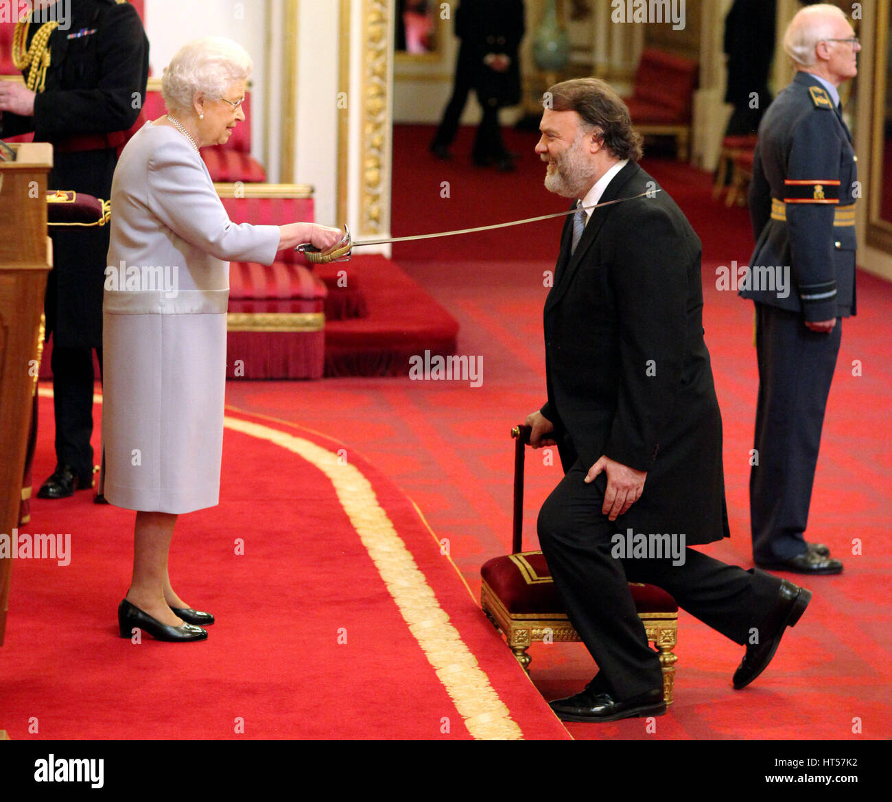 Sir Bryn Terfel Jones from London is made a Knight Bachelor of the British Empire by Queen Elizabeth II at Buckingham Palace. Stock Photo