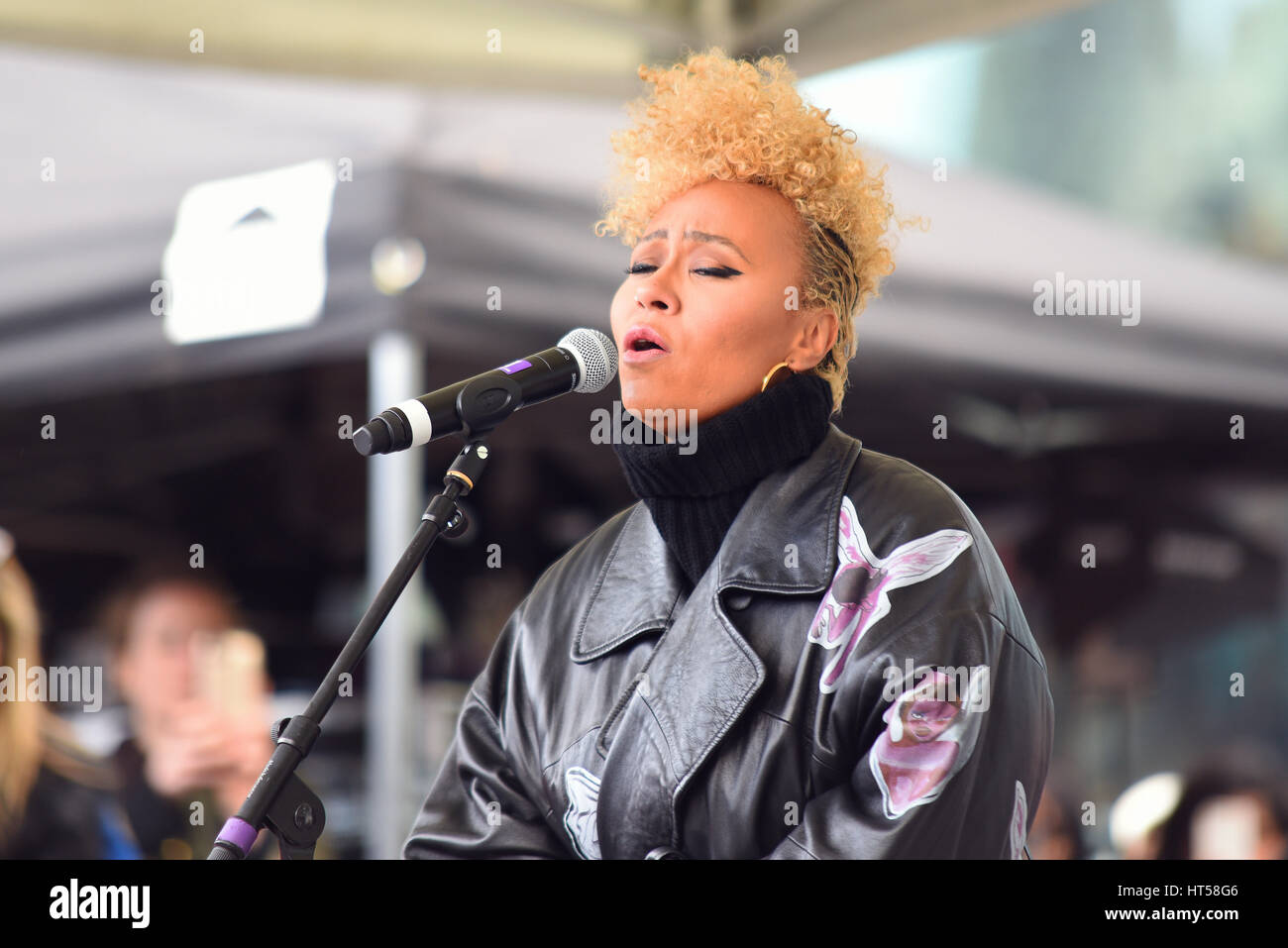 Emeli Sande singing at the March 4 Women on International Womens Day, organised by CARE International and held in The Scoop, City Hall, London Stock Photo