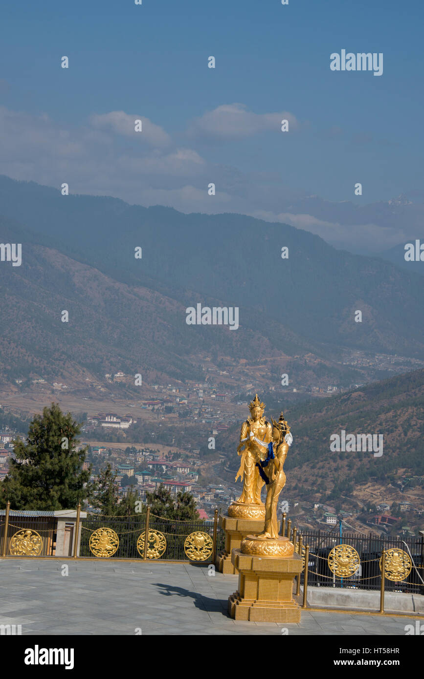 Bhutan, Thimphu. Buddha Dordenma statue. Golden statues around one of the largest Buddha statues in the world with a view of Kuenselphodrang Nature Pa Stock Photo
