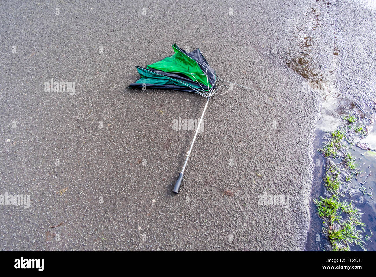 Broken umbrella on ground hires stock photography and images Alamy
