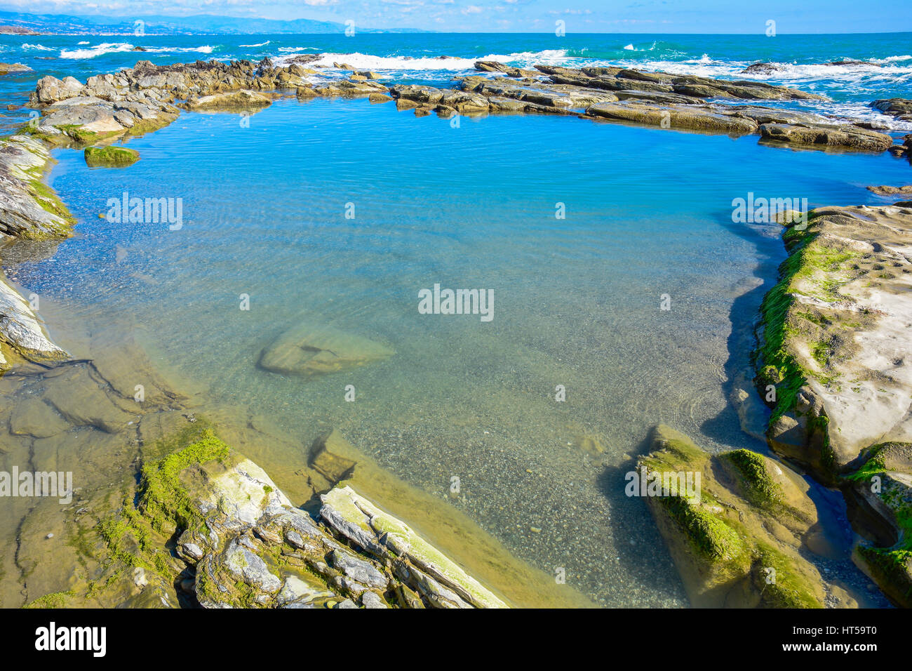 Beautiful landscape, seascape, amazing nature background with rocks and blue water. Stock Photo
