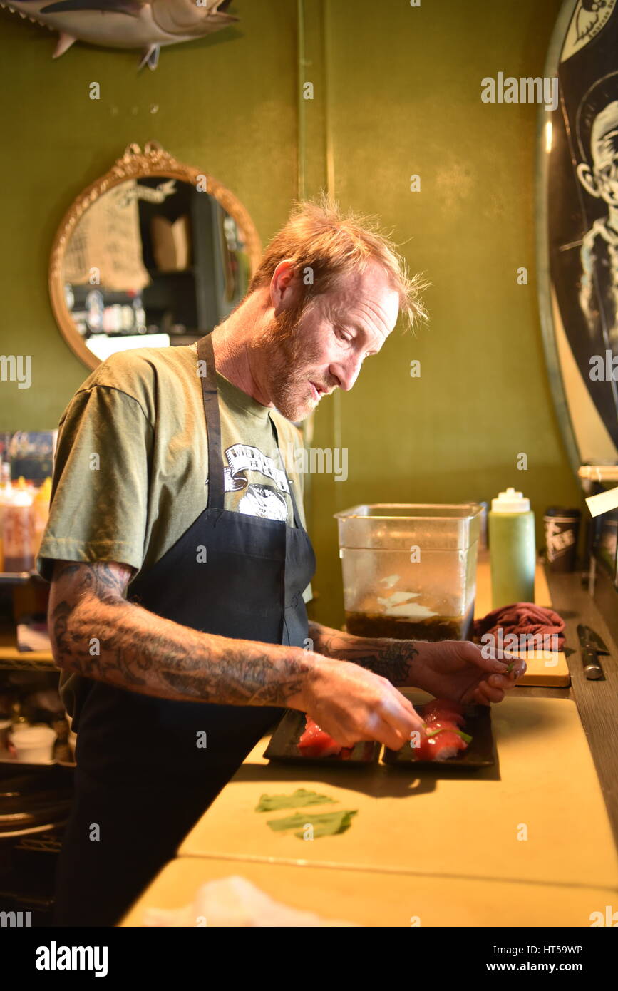 Chef Davin Waite, coowner of Wrench & Rodent Seabasstropub, preparing