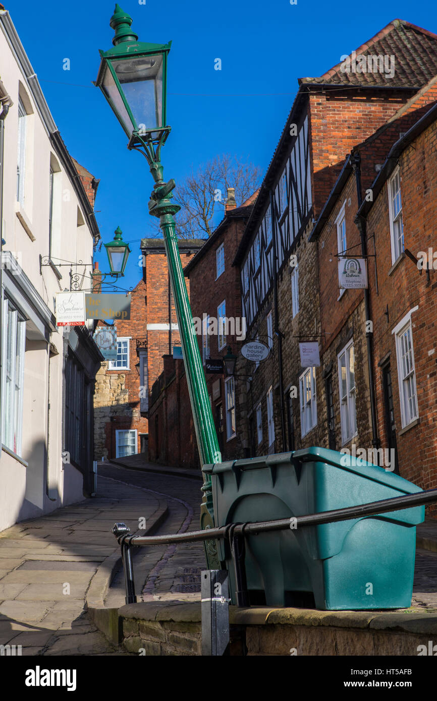 LINCOLN, UK - FEBRUARY 28TH 2017: The famous leaning lamp post situated on the historic Steep Hill in the city of Lincoln, UK on 28th February 2017. Stock Photo