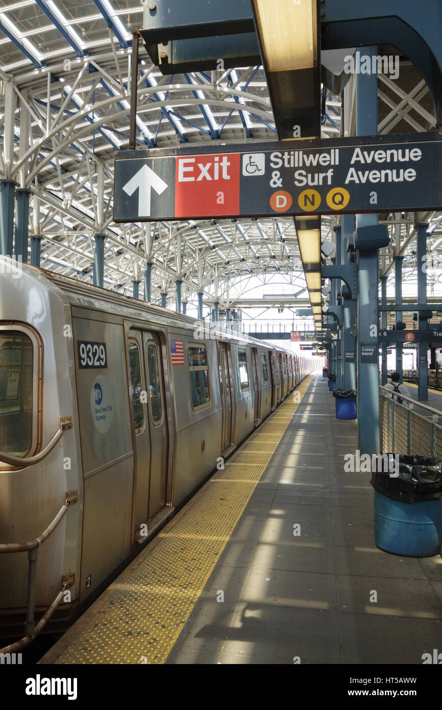NY subway F train at Stillwell Avenue/Surf Avenue, Coney Island, NYC, USA Stock Photo