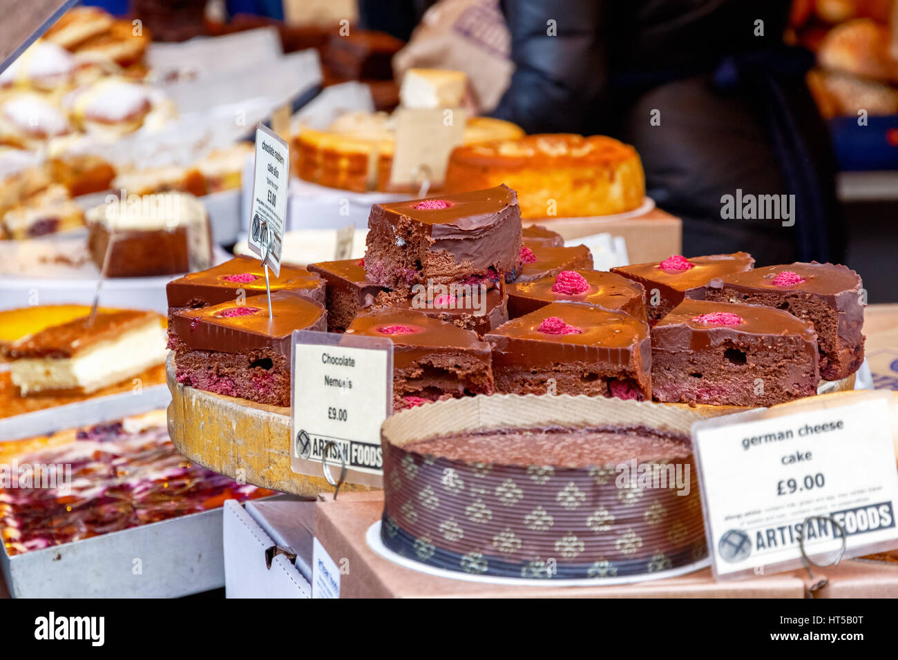 Chocolate raspberry cake slice on display at Borough Market in London Stock Photo