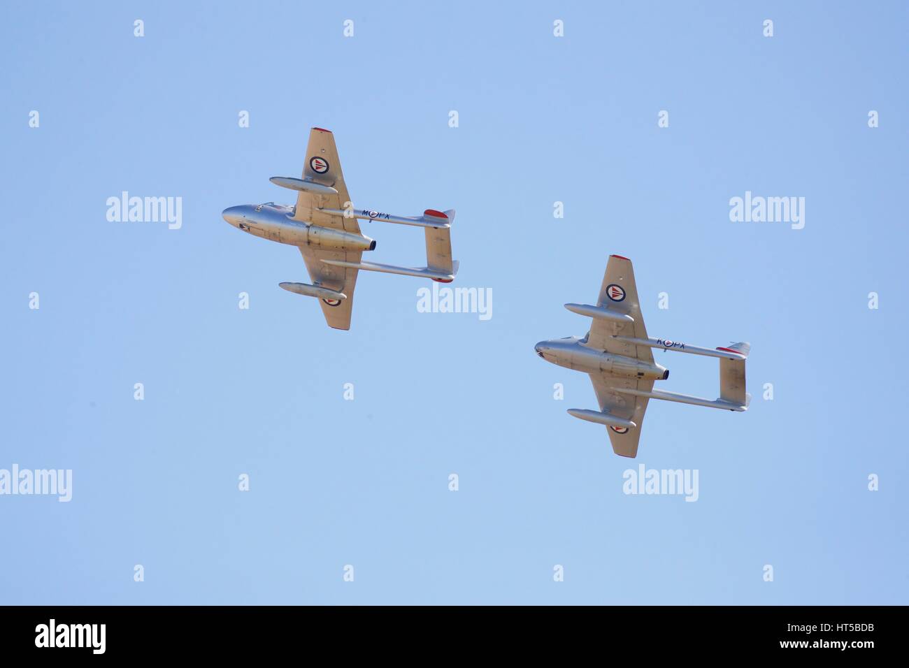 De Havilland Vampire FB.52 and T.55 flying together at Duxford Air Show Stock Photo