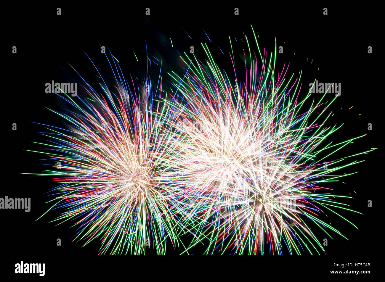 multicolor fireworks on black background Stock Photo - Alamy