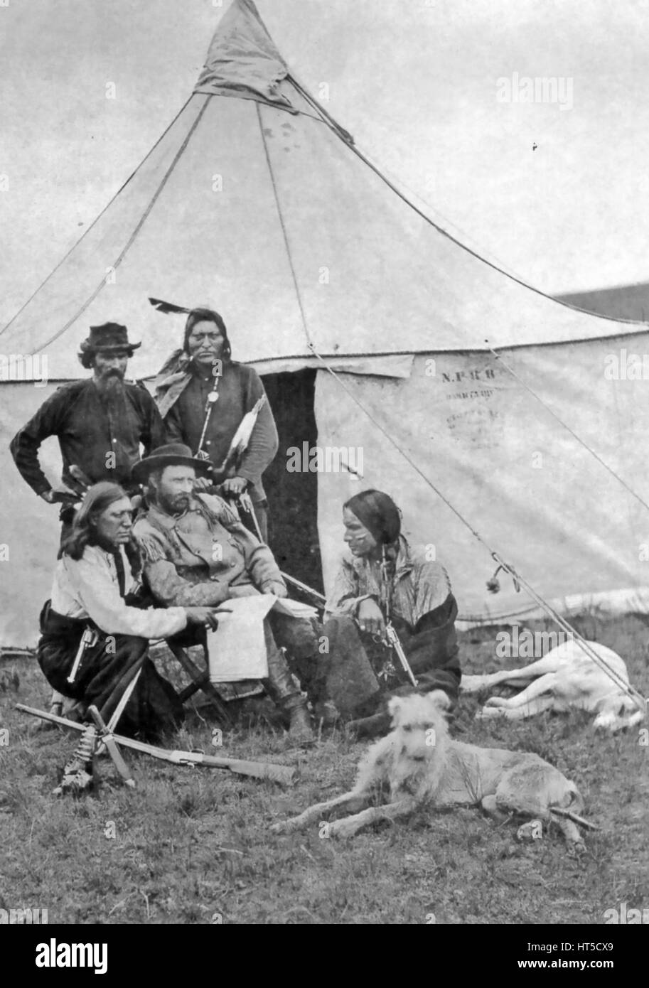 GEORGE ARMSTRONG CUSTER (1836-1876)  American cavalry commander while in charge of protecting workers building the Northern Pacific Railroad in Montana about 1873.  Note the initials N.P.R.R. on the tent. Stock Photo