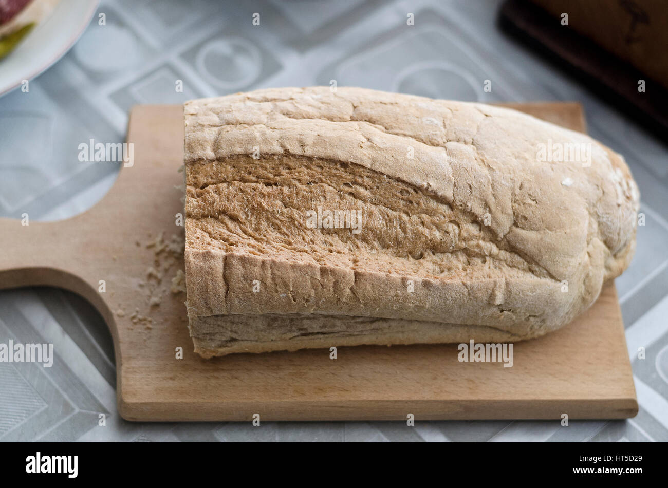 Homemade whole grain bread on a table Stock Photo - Alamy