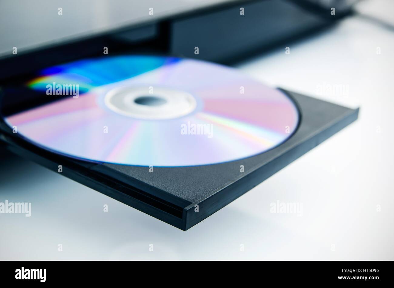 Disc insterted to DVD or CD player Stock Photo