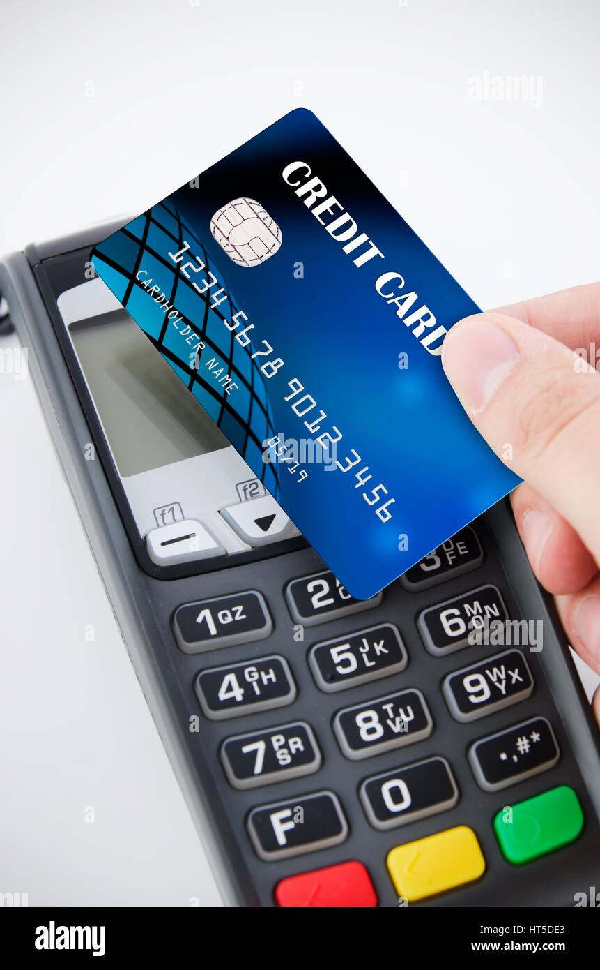 Contactless payment card with NFC chip using with terminal device Stock Photo