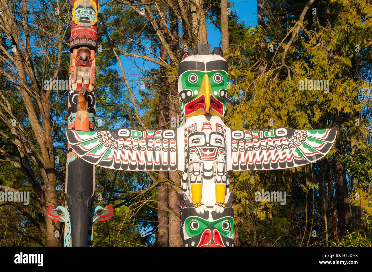 West Coast Native American totem poles at Totem Park, Brockton Point,  Stanley Park, Vancouver, British Columbia Stock Photo - Alamy