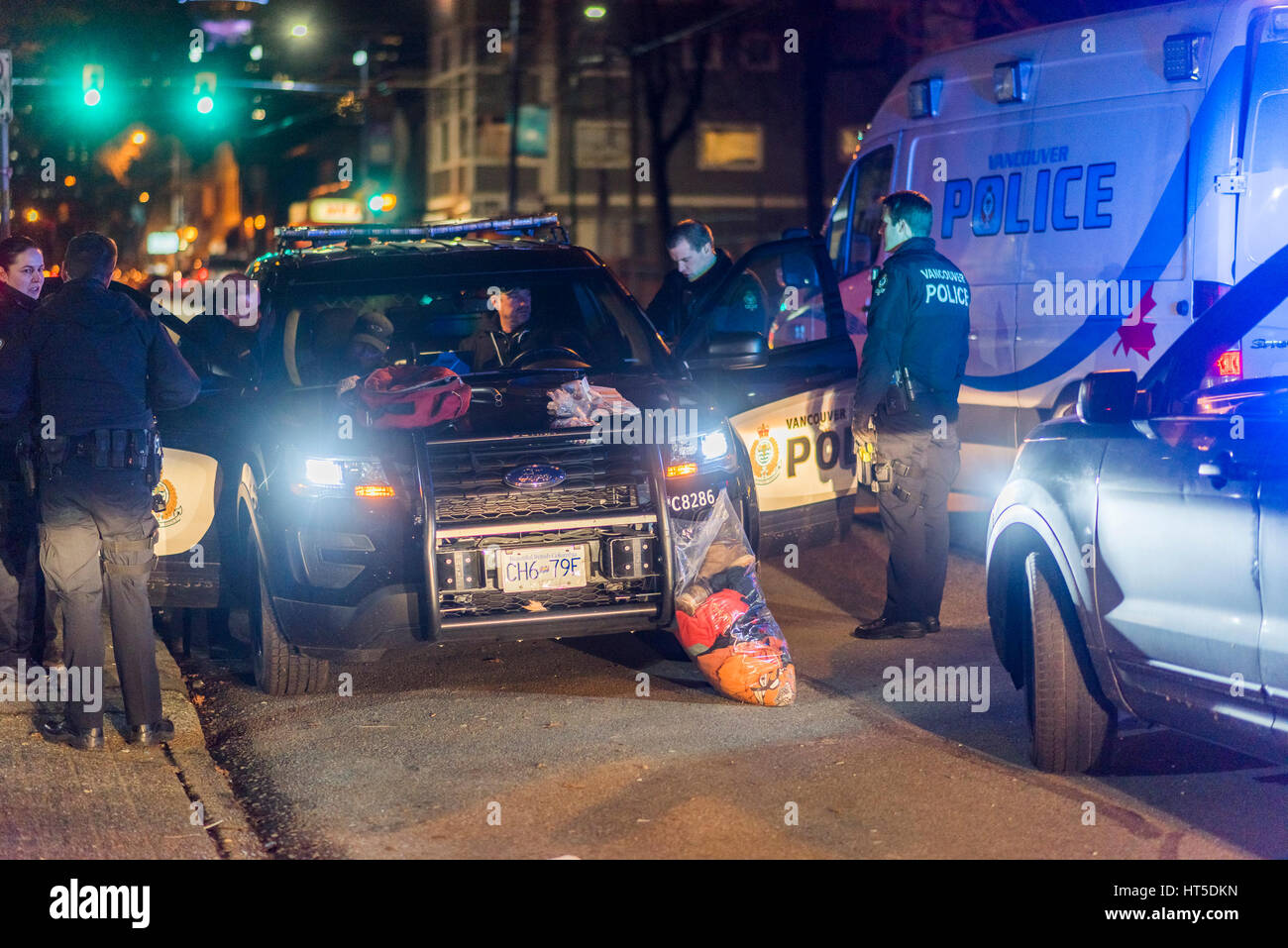 Police investigation in progress, Powell St, DTES, Vancouver, British Columbia, Canada. Stock Photo