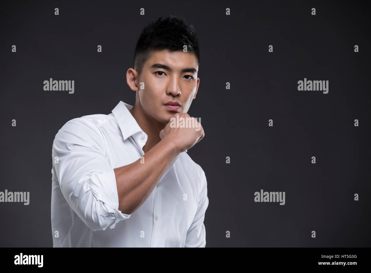 Young muscular man Stock Photo - Alamy