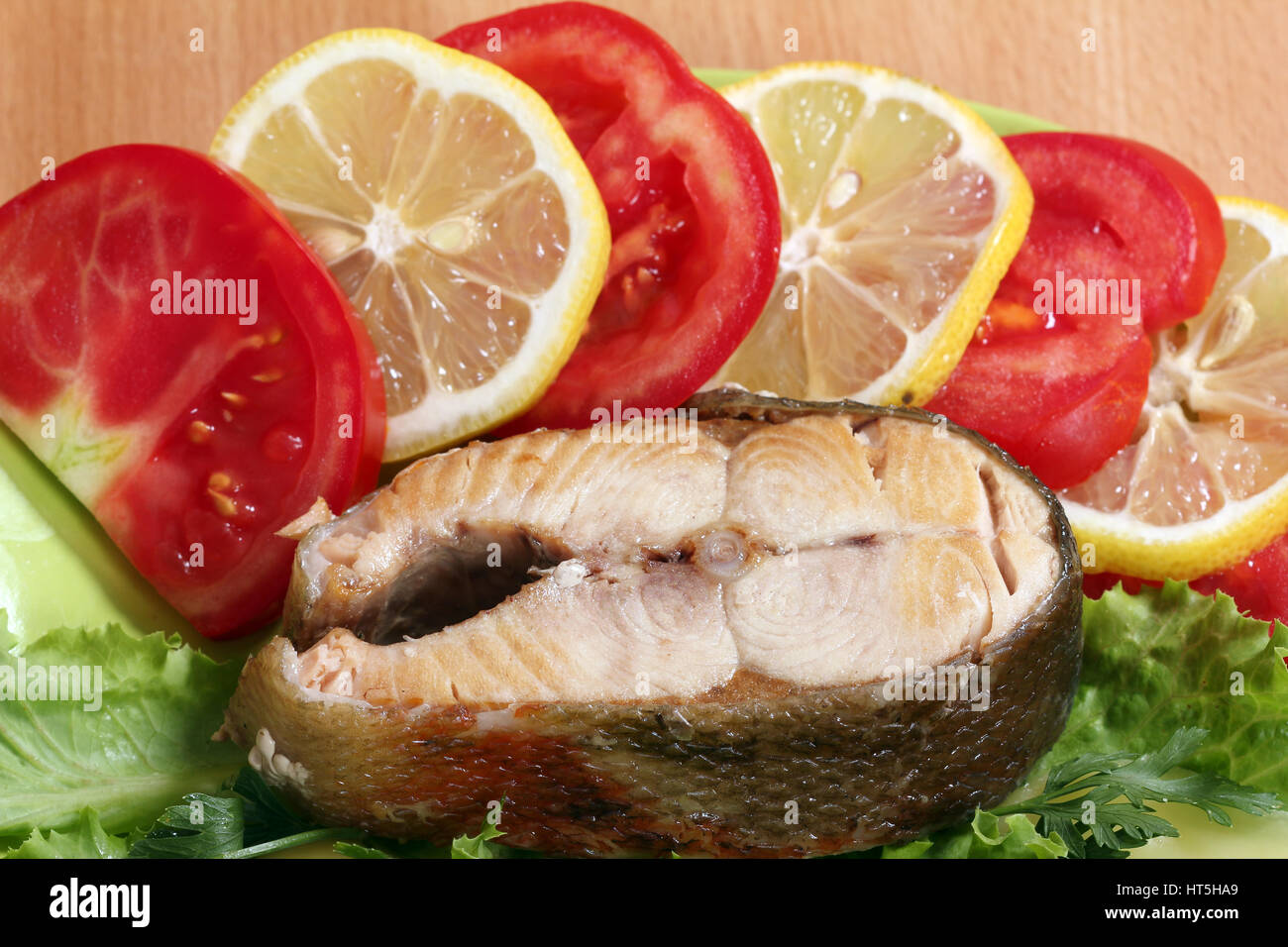 salmon and salad on dish Stock Photo