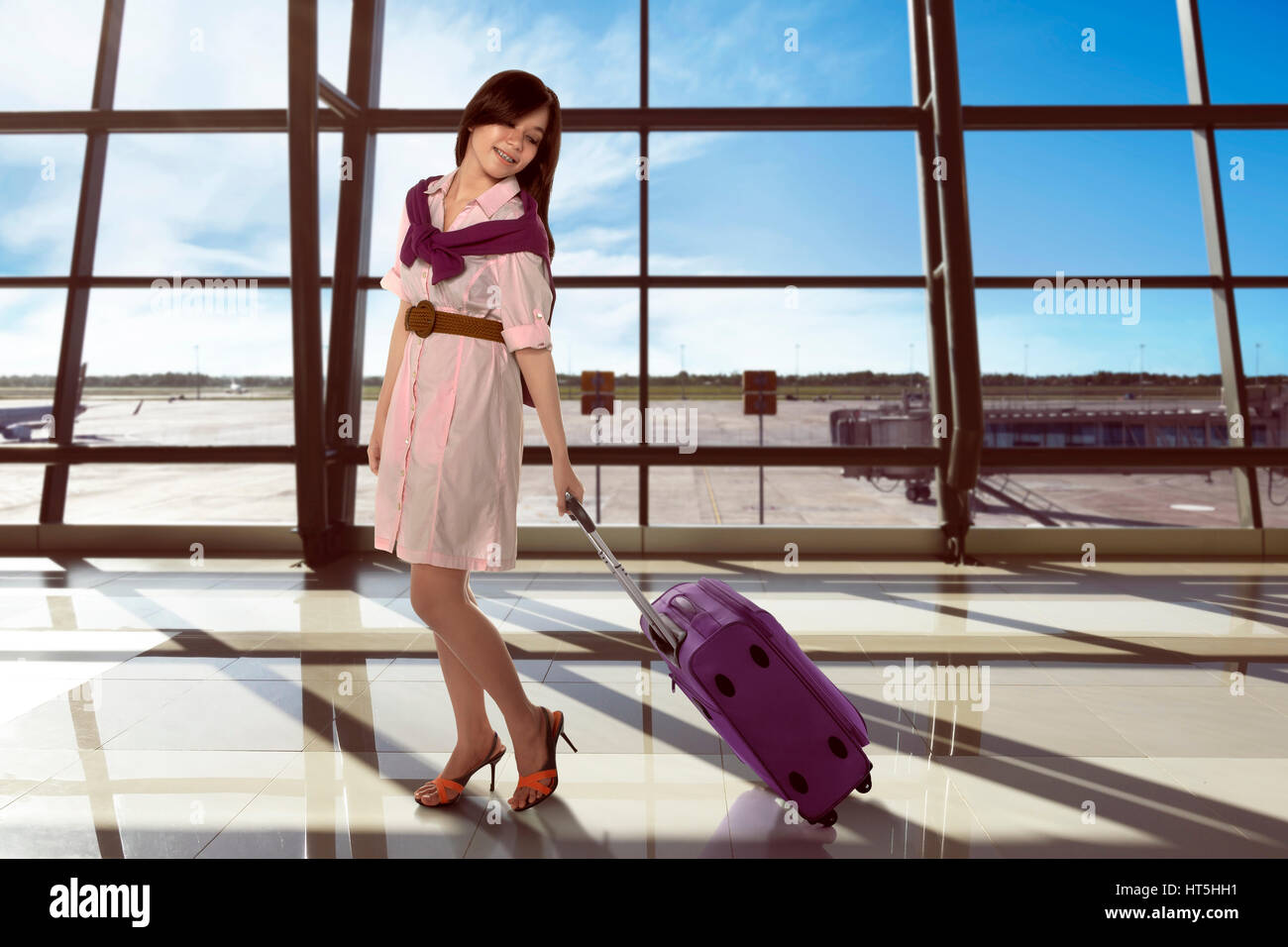 Young asian woman walking at departure lounge with suitcase against window glasses background Stock Photo