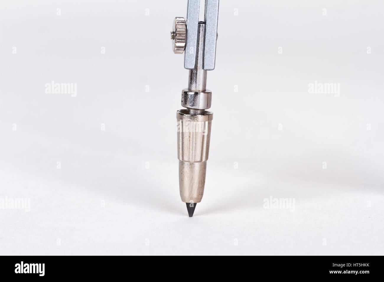 Close up detailed view of iron compasses, isolated on white background ...