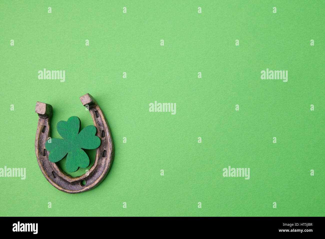 St. Patricks day lucky charms. Horesechoe and shamrock Stock Photo