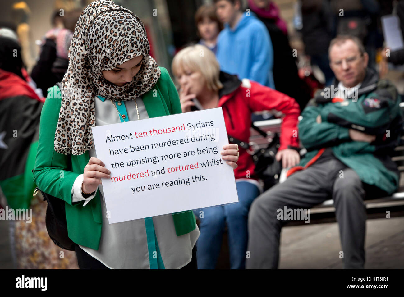 Students in Manchester , UK , protest against  violence in Syria. Pictured in Piccadilly Gardens Stock Photo