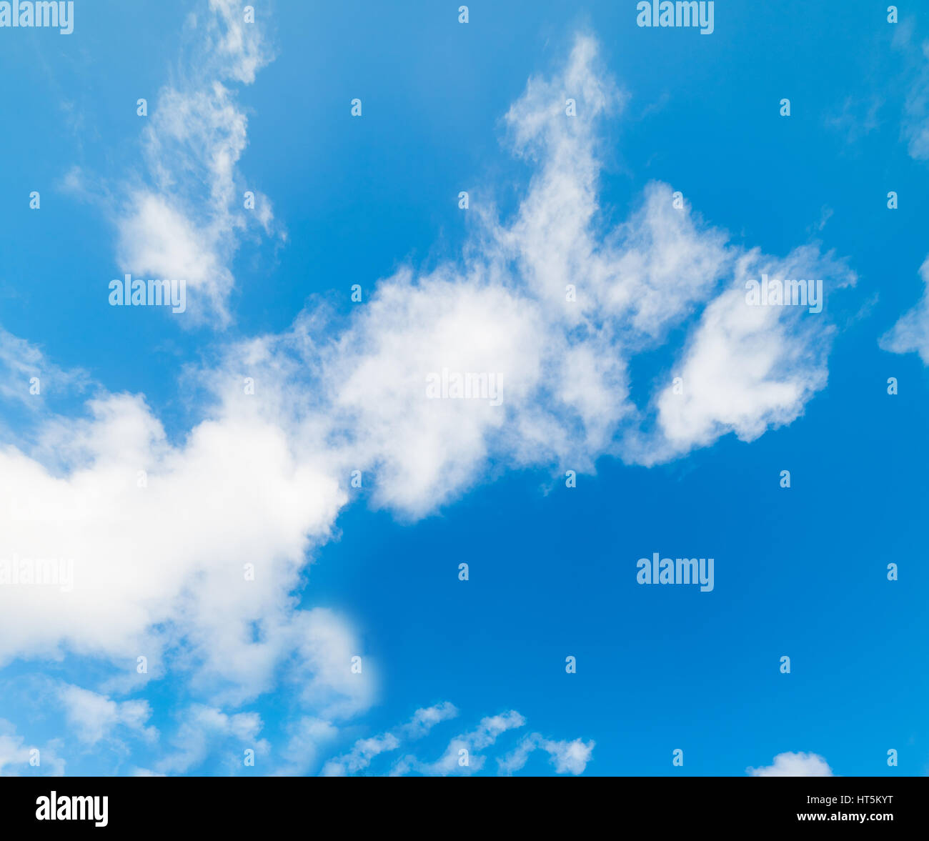 blue sky with white, soft clouds Stock Photo - Alamy