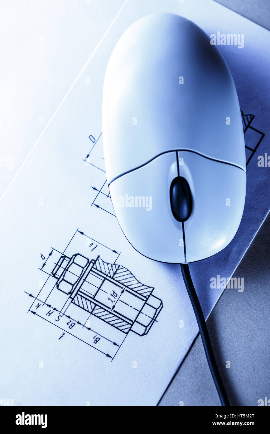 Drafting and computer mouse in toning closeup Stock Photo - Alamy