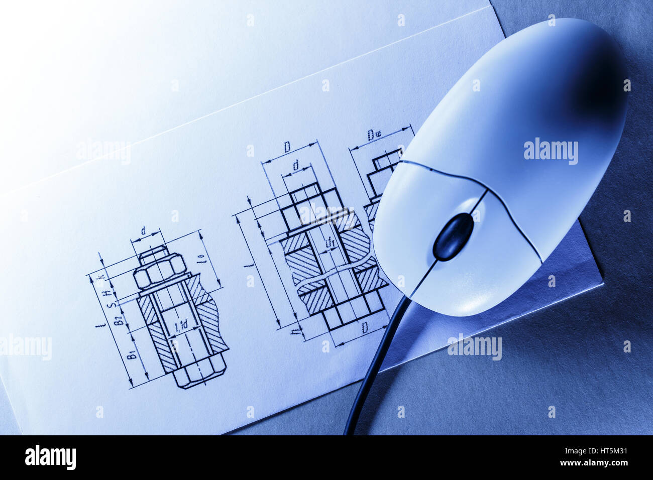 Drafting and computer mouse in toning closeup Stock Photo Alamy