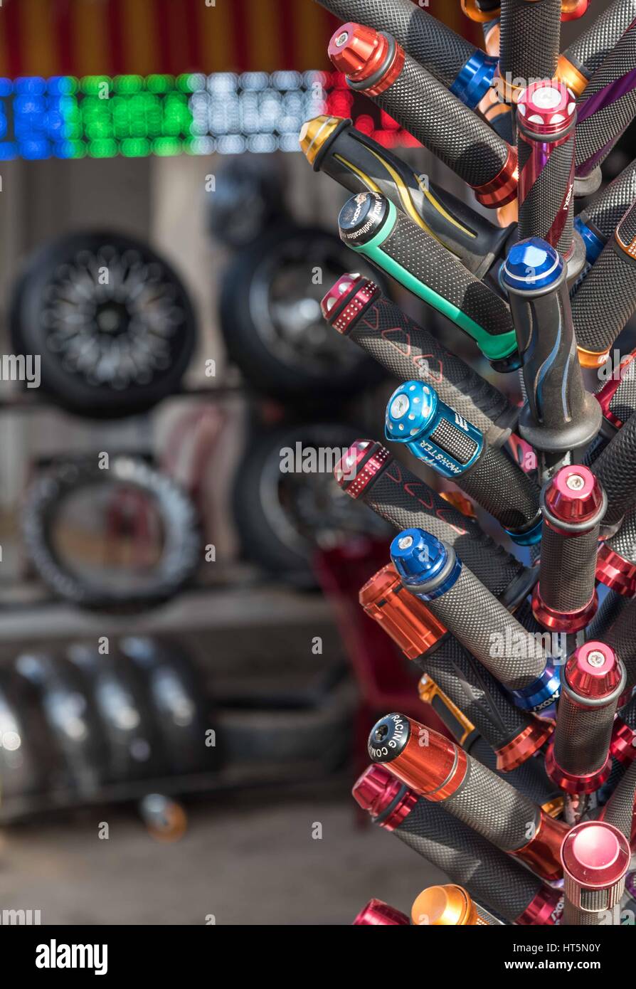 https://c8.alamy.com/comp/HT5N0Y/vibrant-motorbike-accessories-for-sale-at-a-roadside-shop-kampot-cambodia-HT5N0Y.jpg