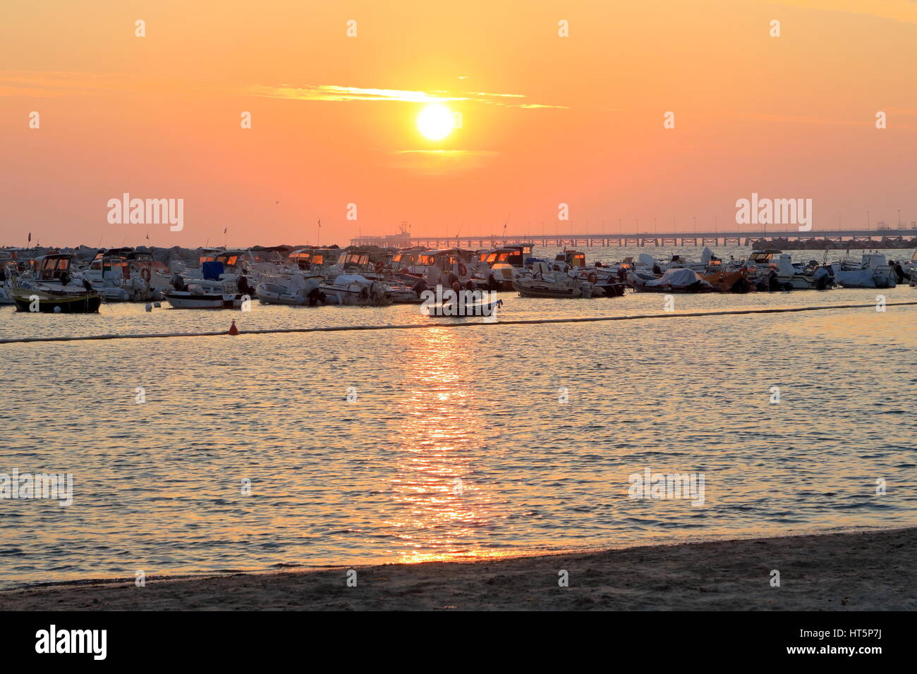 Sunset on the sea romantic view from the sand beach - Vada, Livorno, Tuscany, Italy, Europe Stock Photo