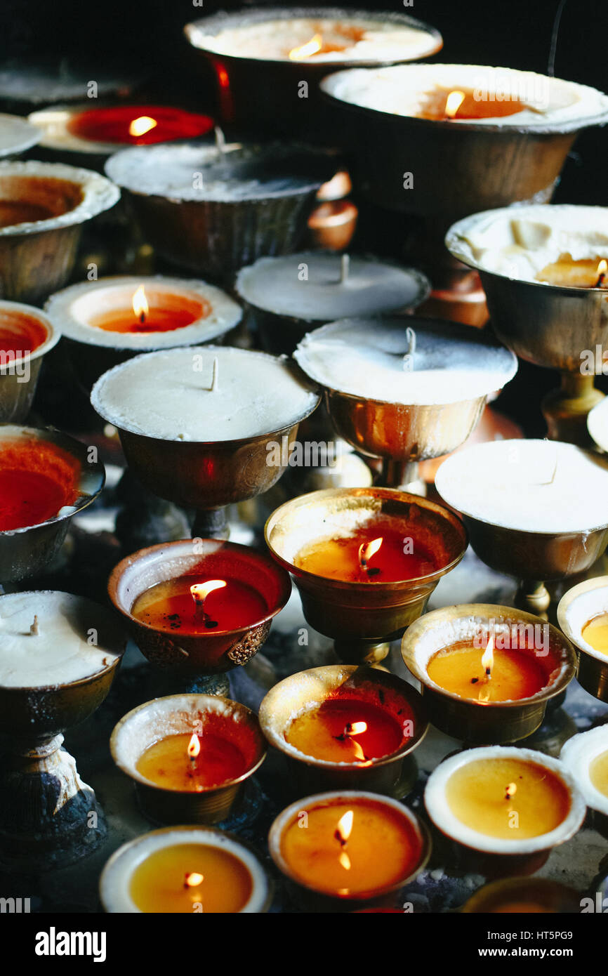 Oil lamps burning in the temple Stock Photo Alamy