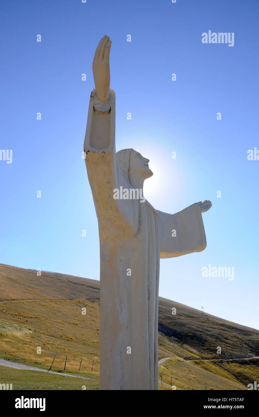 Christ with open arms invokes peace to the valley Stock Photo