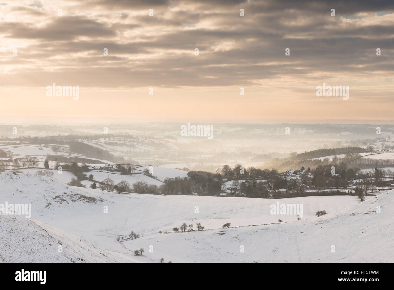 Dovedale covered in Winter snow at Sunrise, Peak District, United Kingdom Stock Photo