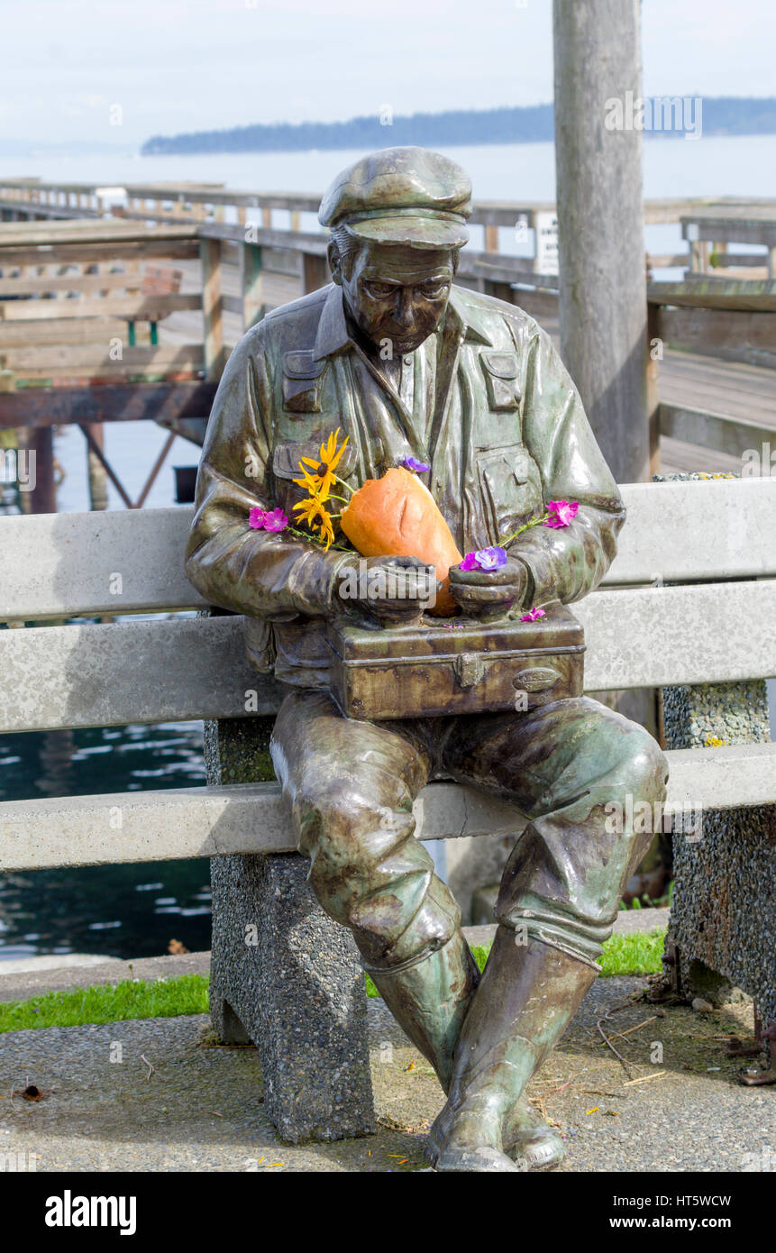 Sculpture of a fisherman Stock Photo Alamy